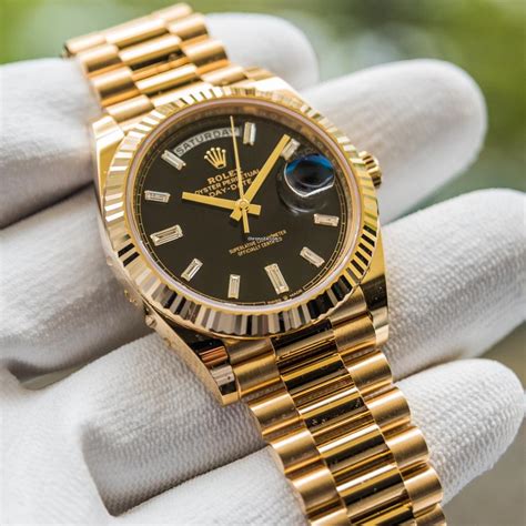 rolex day date 40 gold black|Rolex Day-Date 40mm price.